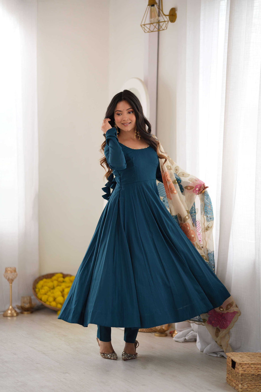 Naarira Tealblue Heavy Roman Silk Anarkali Gown