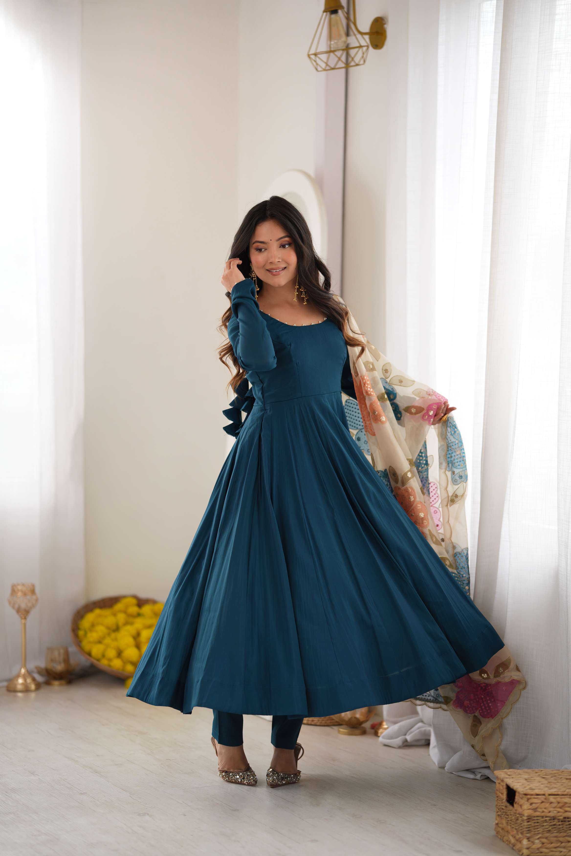 Naarira Tealblue Heavy Roman Silk Anarkali Gown