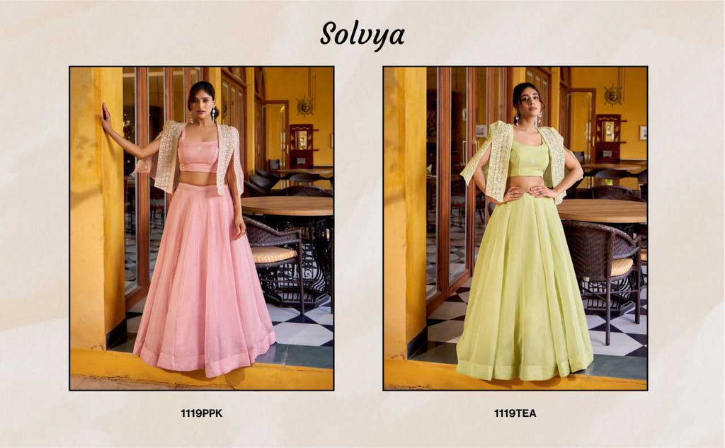 A catalog-style composite showing two models wearing the same Solvya ethnic outfit in different colorways. The left panel shows a pink set with a beige draped overlay, and the right panel shows a light yellow-green set with the same beige overlay.