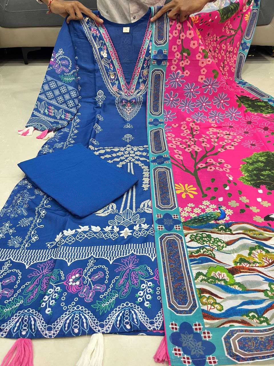 Colorful fabric with intricate patterns on a plain background
