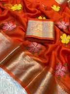 Orange saree with floral embroidery and Kanchipuram Organza border