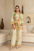 Woman wearing a colorful outfit in a living room setting with 'I Love' branding.